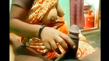 Aunty’s Skilled Hands Shaping A Young Man’s Eager Cock