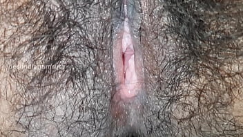 A Sweet Indian Girl Pleasures Herself, Fingering Her Tight, Hairy Pussy Until She Comes Just Before Her Boyfriend Arrives.