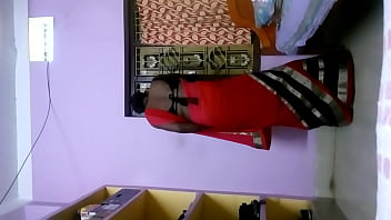 Sizzling In Scarlet, Deepika Bhabhi’s Hips Sway With A Rhythm All Her Own, Right In The Heart Of Her Home.