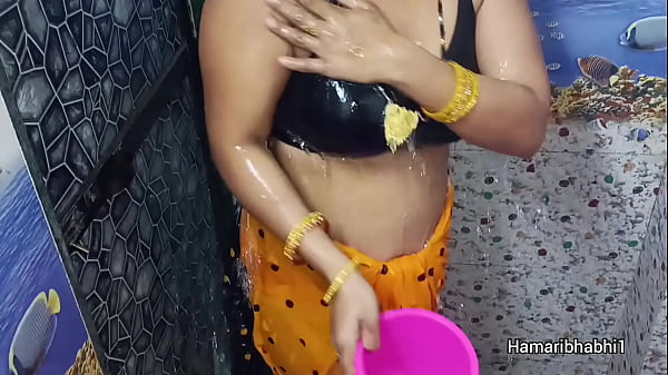 Sultry Desi Bhabhi’s Steamy Saree Shedding Shower